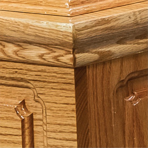 Corner of The Devonshire showing the routed panel end and the solid oak double mouldings