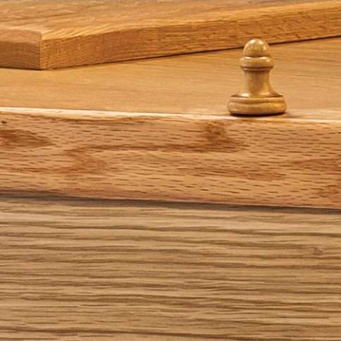 Turned wooden lid fitting and the solid oak lid moulding of The Willersley, in a natural matt finish